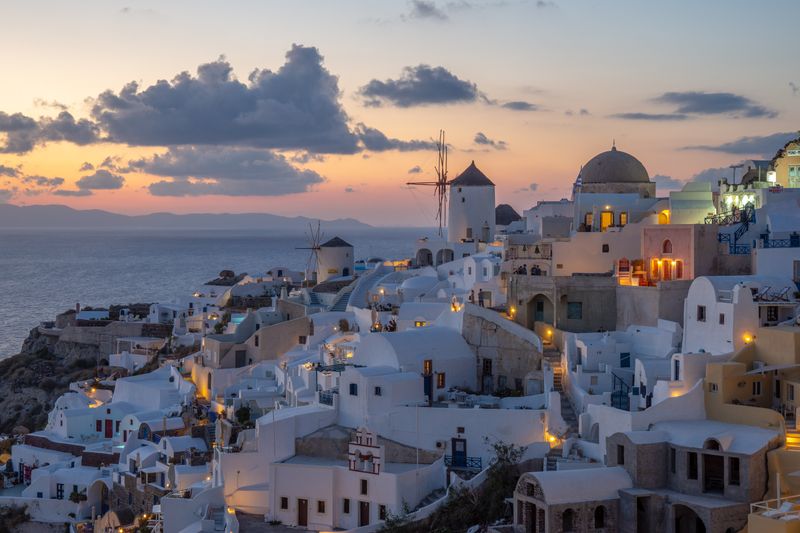 Sunset over the white houses of Oia