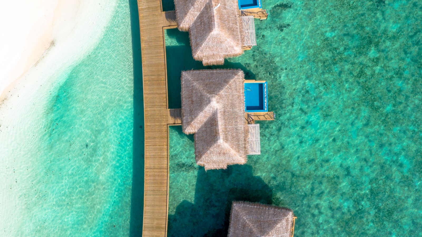 Maldives overwater villas aerial