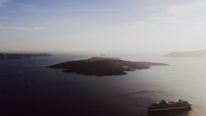 Aerial view of the caldera cliffs at sunset