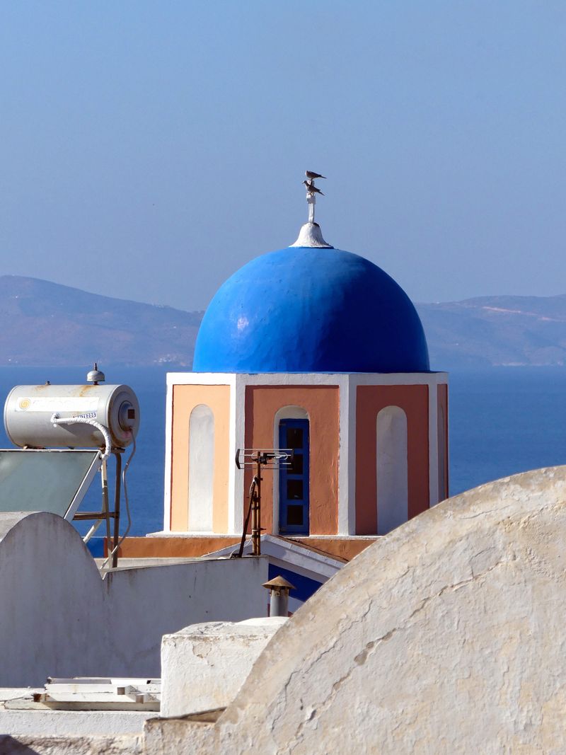 Blue dome with the Aegean Sea behind