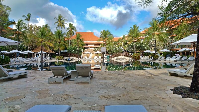 Resort pool surrounded by tropical gardens in Bali