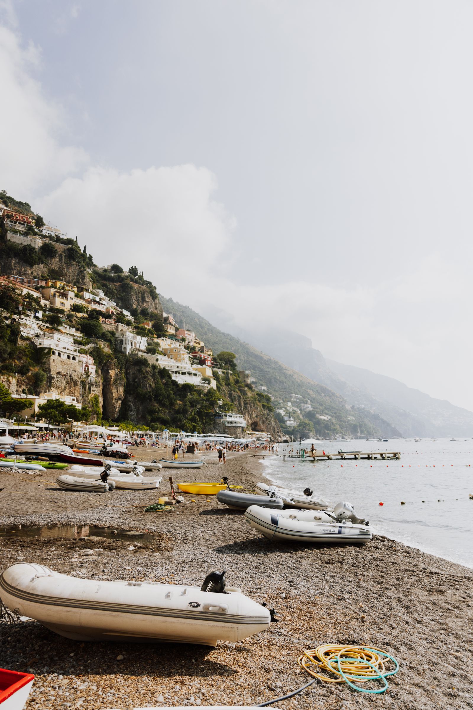Positano beach boats and colorful village