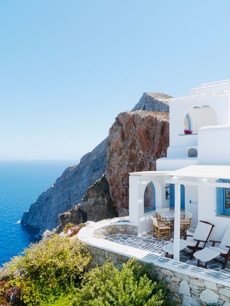 White cliffside villa overlooking the Aegean
