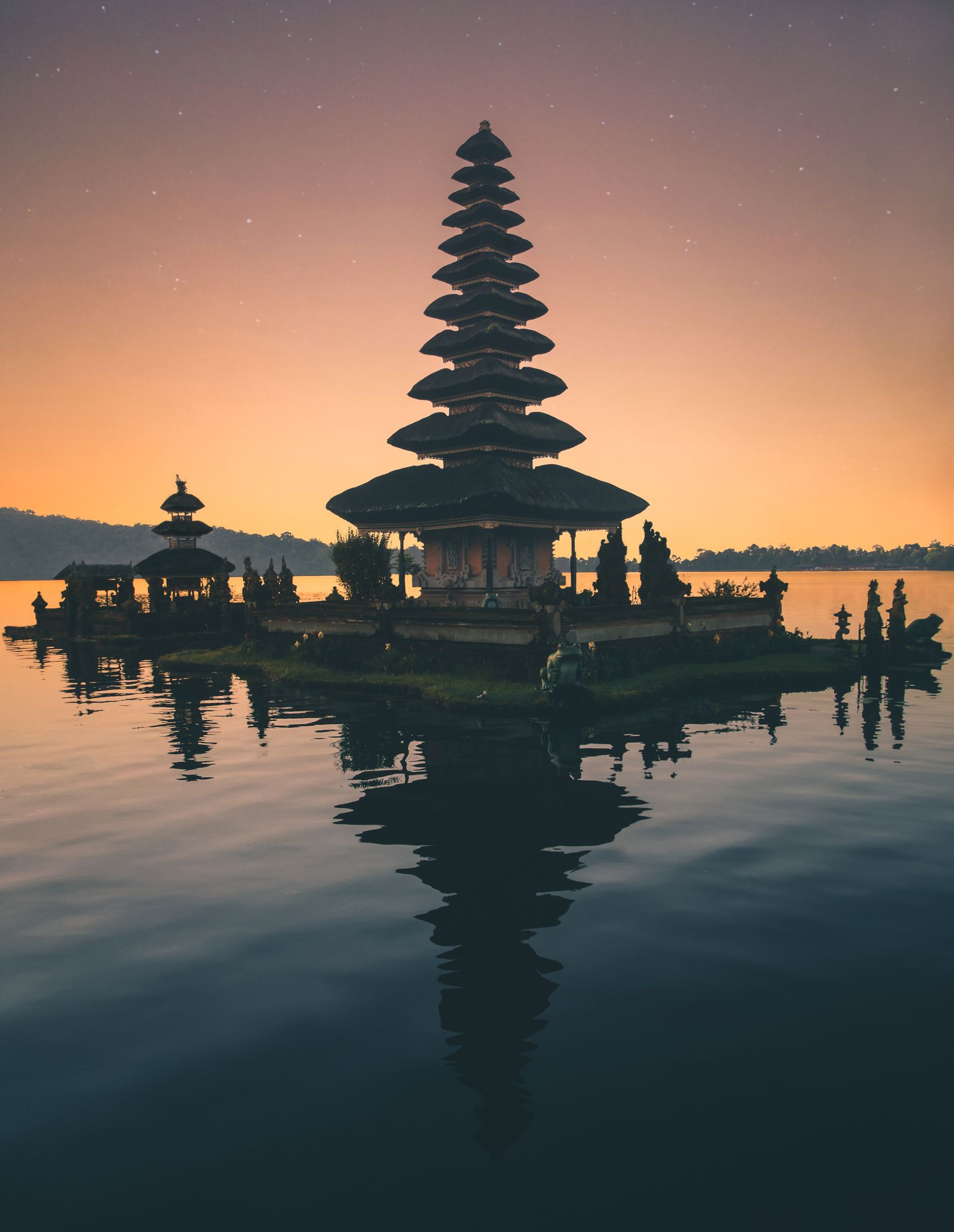 Ulun Danu Beratan water temple on a Bali lake at sunset